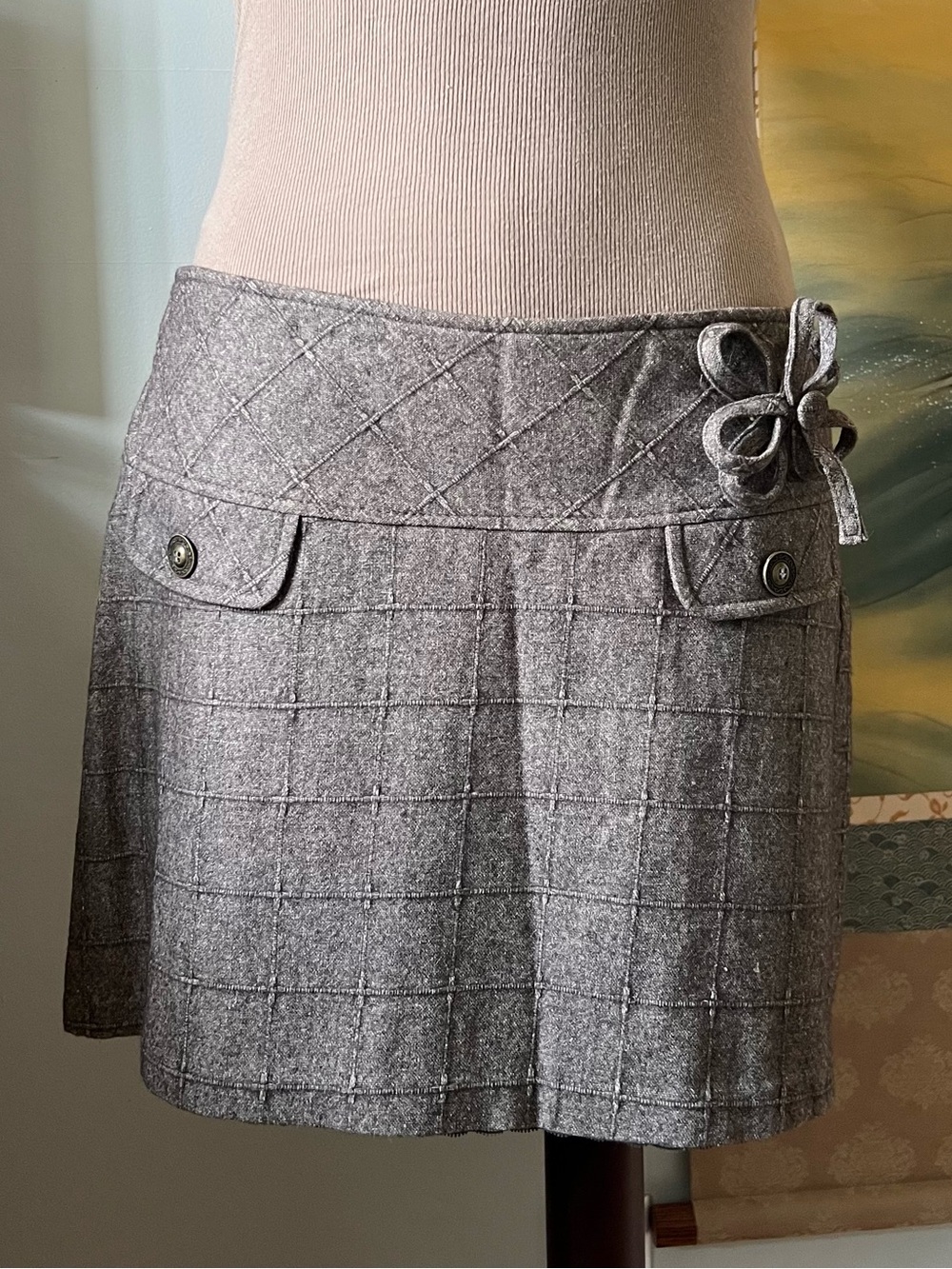 “Groggy” Gray Wool-Blend Plaid Mini Skirt with Bow Detail and embroidery